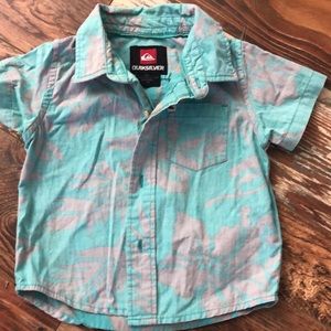 Button-up, collared, quicksilver shirt.